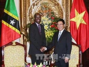 越南政府副总理兼外交部长范平明与斯里兰卡外交部长佩雷斯